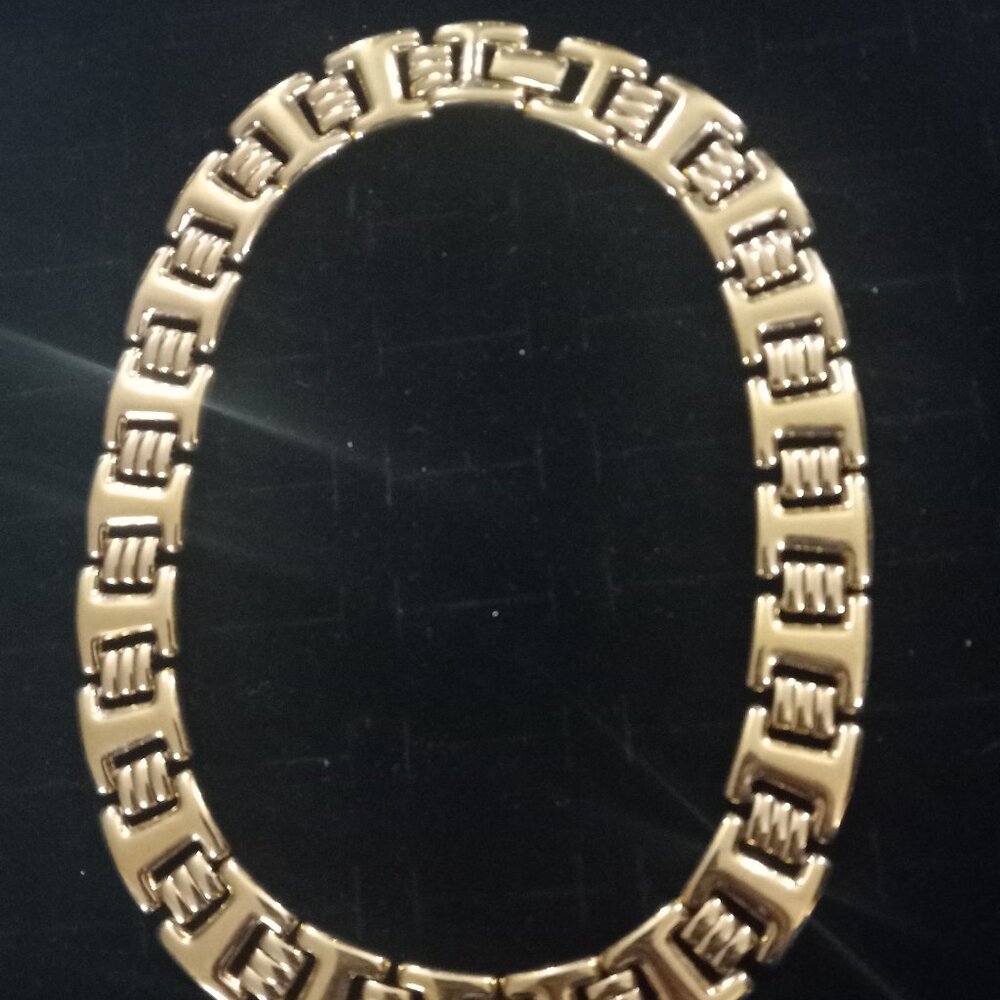 Gold toned monet necklace.